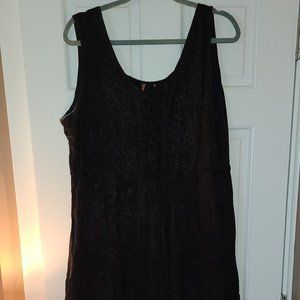 Black tank dress with ruffled accents